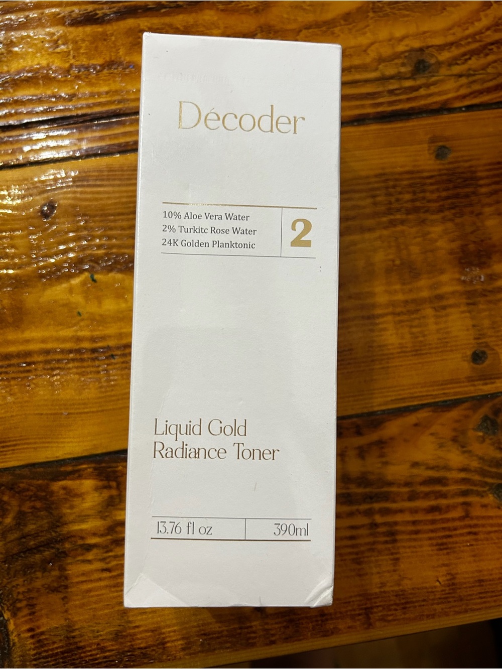 Décoder Liquid Gold Radiance Toner - White & Gold Box